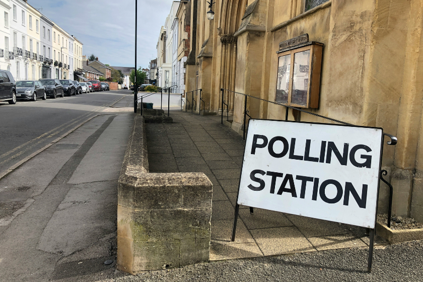 A sign reading ‘Polling station’ placed outside a community centre