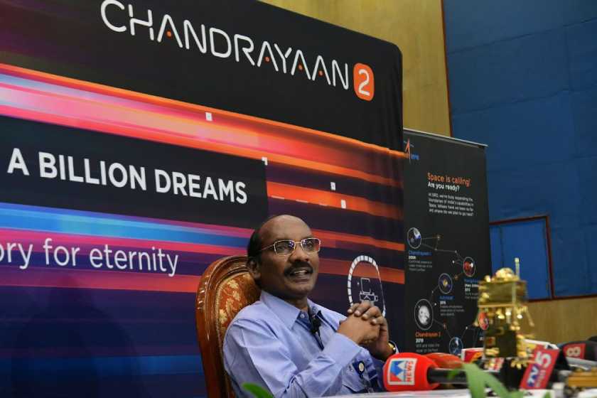 Photo hairman of the Indian Space Research Organisation (ISRO) Kailasavadivoo Sivan. He is being interviewed by the press, he has a very satisfied and confident look on his face. 