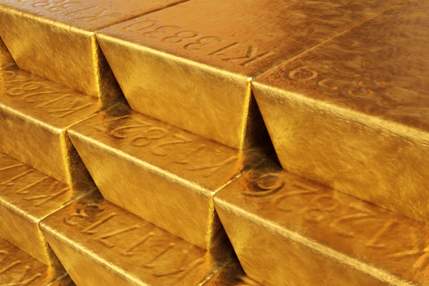gold bars stacked on top of another