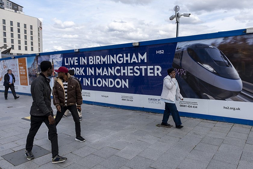 Promotional hoarding for HS2 carries the slogan 'live in Birmingham, work in Manchester, play in London'.