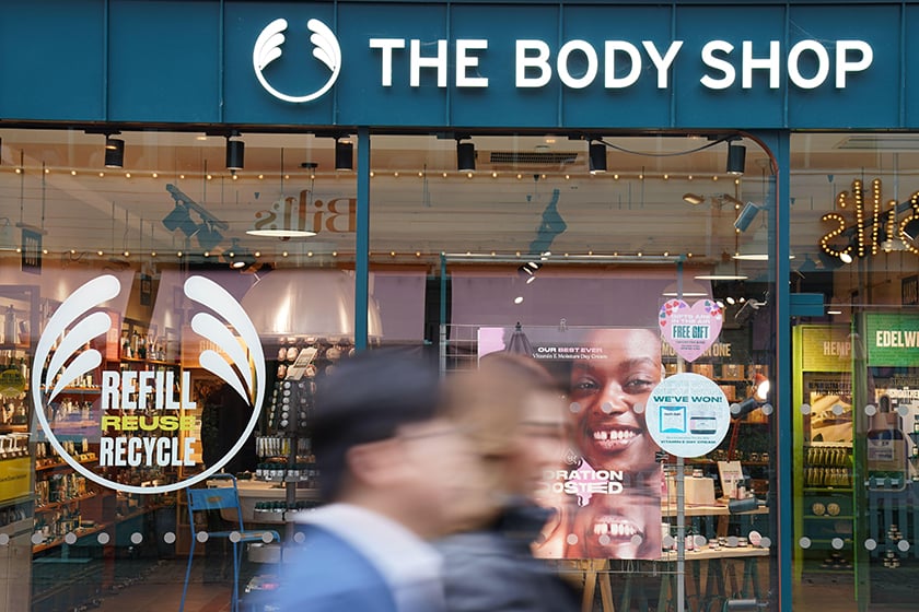 People walk past a Body Shop store in Canterbury, Feb 2024.
